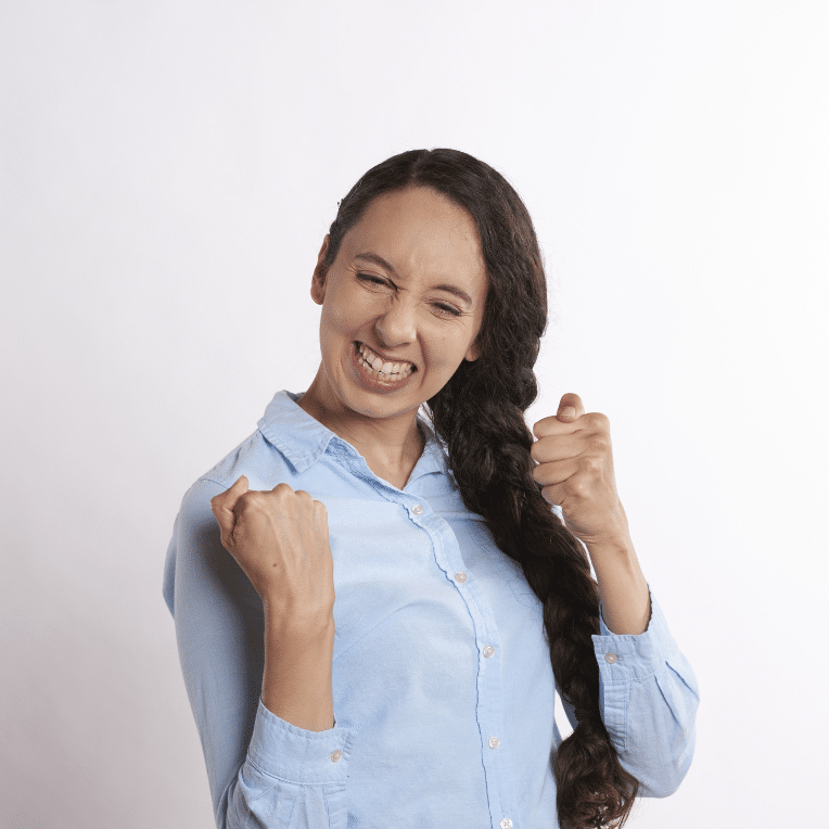 happy woman in front of a wihte background